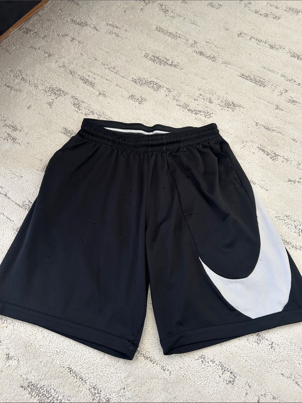 Nike Black Athletic Shorts with White Swoosh Accent